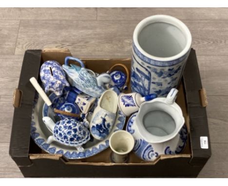 A Chinese blue and white stick stand, delftware, piggy bank etc