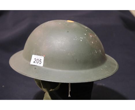 British WWII style helmet with liner and chinstrap. P&amp;P Group 2 (£18+VAT for the first lot and £2+VAT for subsequent lots