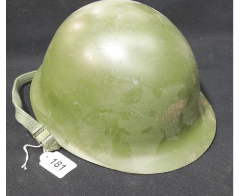 A Chinese PLA helmet with liner. P&amp;P Group 2 (£18+VAT for the first lot and £2+VAT for subsequent lots) 