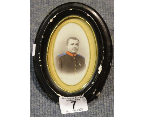 Framed hand tinted portrait miniature of a Russian soldier 90 x 50 mm. P&amp;P Group 1 (£14+VAT for the first lot and £1+VAT 