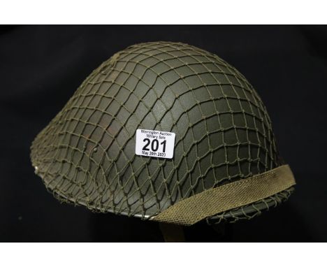 British WWII style helmet with liner and webbing. P&amp;P Group 2 (£18+VAT for the first lot and £2+VAT for subsequent lots) 