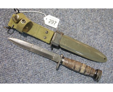 American WWII period bayonet, blade marked SAB Ridgefield MJ, scabbard stamped US M8A1, L: 29 cm, blade L: 16 cm. P&amp;P Gro