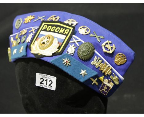 Russian field cap with a large quantity of badges. P&amp;P Group 2 (£18+VAT for the first lot and £2+VAT for subsequent lots)