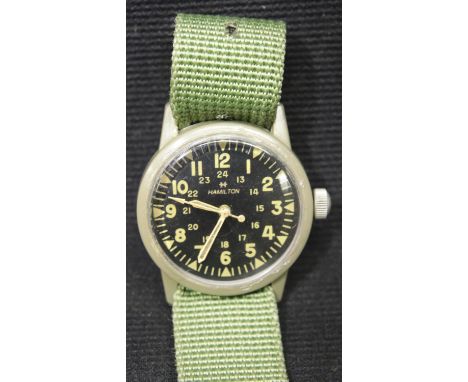 Vietnam War style Westclox manual winding plastic cased Special Forces disposable wristwatch dated 1968, working at lotting. 