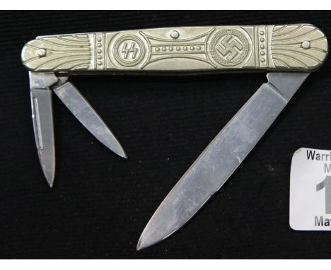 Brass penknife with swastika and SS design, L: 9 cm. P&amp;P Group 1 (£14+VAT for the first lot and £1+VAT for subsequent lot