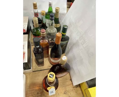 Various bottles of spirits including White Horse and Red Label Scotch Whisky, Dry London Gin, etc.