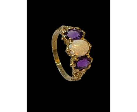 Opal and amethyst three stone 9 carat gold ring, size Q.