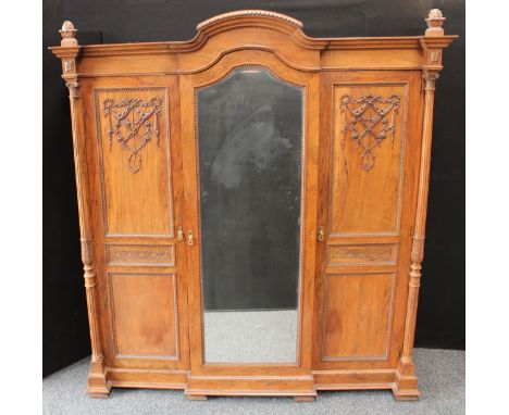 A substantial late 19th century walnut five-piece bedroom suite, the wardrobe labelled Maple &amp; Co, comprising wardrobe, a