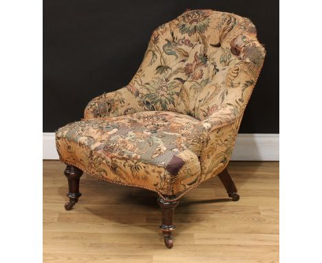 A Victorian low club or drawing room chair, shaped button back, serpentine seat, turned forelegs, 69.5cm high, 59cm wide, the