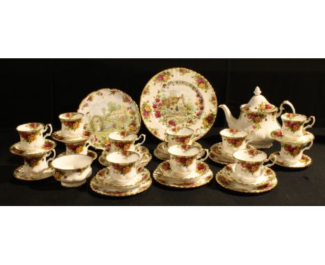 A Royal Albert Old Country Roses pattern teapot, six teacups, saucers and tea plates, six coffee cups and saucers, sugar bowl