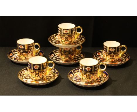 A Royal Crown Derby 2451 pattern Imari coffee set, comprised of 12 pieces; 6 coffee cups and 6 saucers (12). 