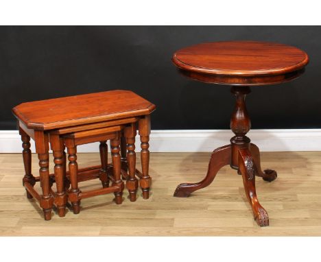 An oak nest of three occasional tables, the largest 44.5cm high, 58cm wide, 38cm deep; a George III inspired tripod occasiona