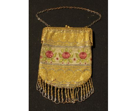 An Art Deco beadwork evening bag, decorated in tones of gold and silver, with stylised central floral band. 