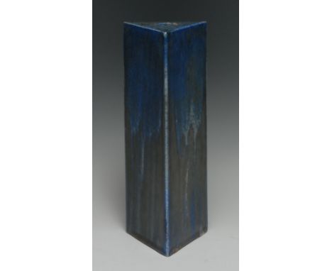 A Ruskin matt crystalline triangular prism shaped lamp base, in mottled blue and ochre, 25cm high, incised mark 