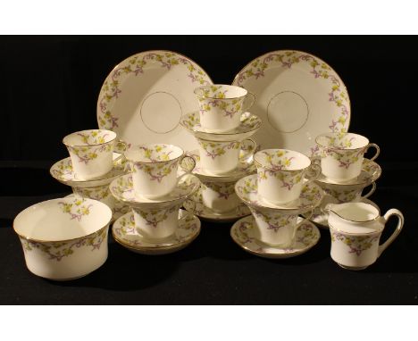 An early 20th century Salon China (Salt &amp; Nixon) part tea service comprising cake plates, side plates, sugar bowl, cream 