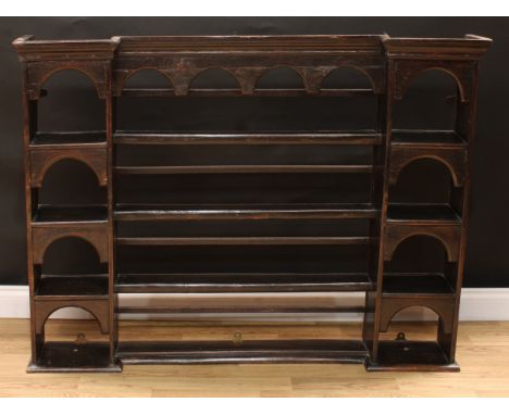 A George III oak dresser shelf or 'Delft' plate rack, 106cm high, 142cm wide, 21.5cm deep 