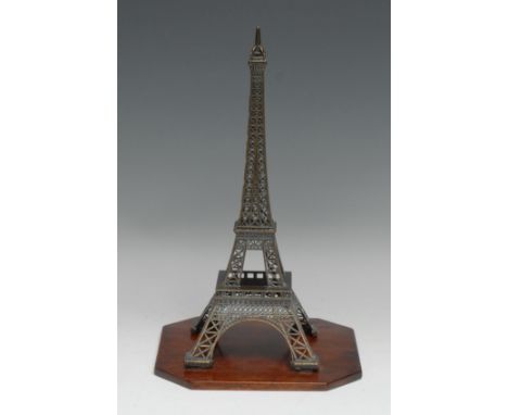 An architectural library desk model, of the Eiffel Tower, canted square hardwood base, 32cm high 
