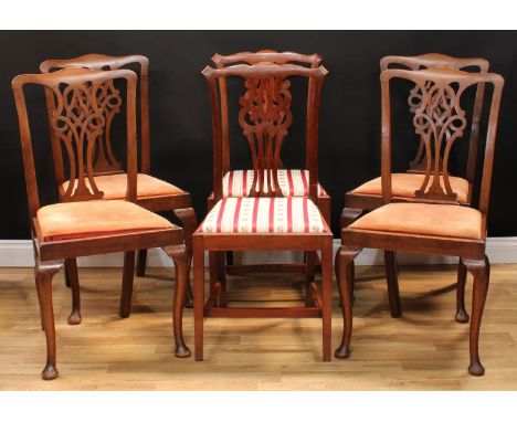 A set of four Chippendale design dining side chairs, 97.5cm high, 53cm wide, the seat 44cm wide and 35cm deep; another pair, 