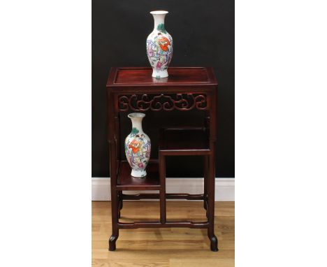 A Chinese hardwood floor standing jardiniere and vase stand, rectangular panel top above a pierced frieze carved with scrolls