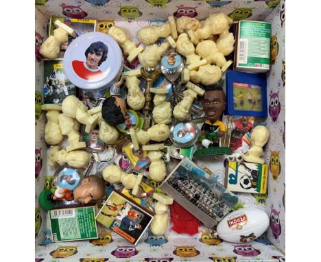 Box of soccer memorabilia: keyrings, badges; figurines, magnets, etc. with famous footballers and/or commemorating World Cups