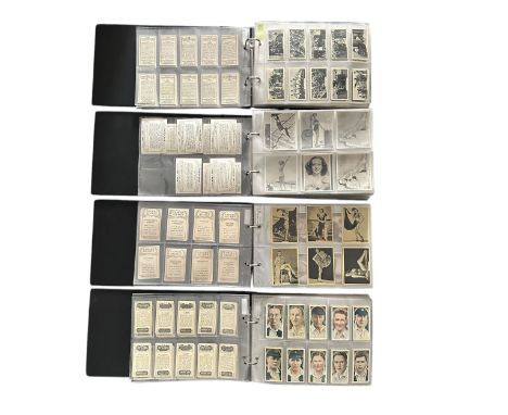 Ardath cigarette card collection, sleeved in four albums, Britain's Defenders (22), Cricket, Tennis &amp; Golf Celebrities (8