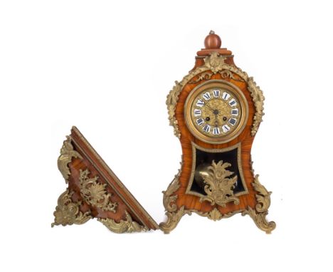 FRENCH KINGWOOD MANTEL CLOCK AND WALL BRACKET OF ROCOCO DESIGN, the clock with two train movement, the gilt dial with white e
