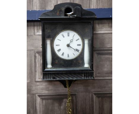 LATE 19TH CENTURY BLACK FOREST CUCKOO CLOCK, with two train movement, the white enamel dial with Roman numerals, flanked by t