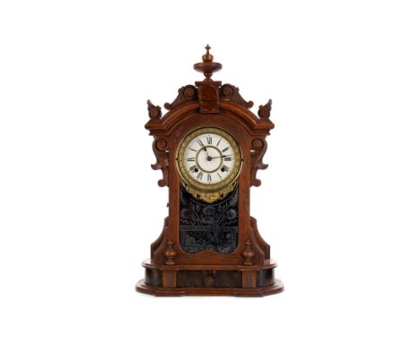 VICTORIAN WALNUT MANTEL CLOCK, with two train eight day movement, the white enamel dial with Roman numerals, the glazed case 