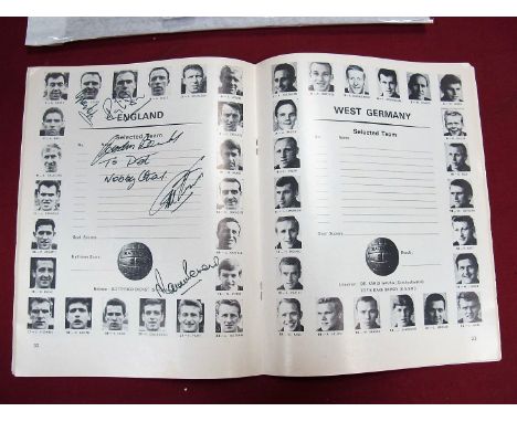 England 1966 Autographs, banks, Wilson, Cohen, Stiles, Hurst, Peters, all black pen signed in a reprint world cup finial prog