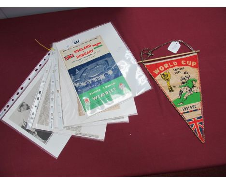 A 1953 England v. Hungary Match Programme, (creased), ticket, images and press cuttings related to the game.. An England 1966