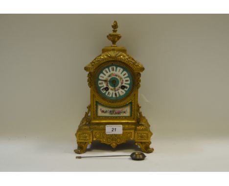 A French Louis XVI-style ormolu mantel clock, turquoise dial, Roman numerals, twin-train movement