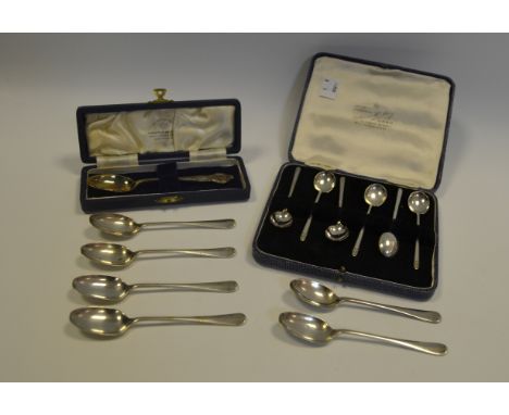 An associated set of six Art Deco silver tea spoons, James Dixon, cased; a set of six Hanoverian pattern silver spoons; a sil