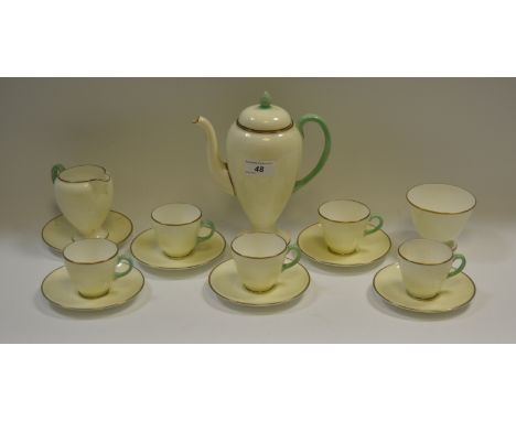 A Wedgwood part coffee service gilt edge, green painted finial c.1920 