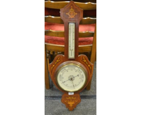 An Edwardian Sheraton Revival mahogany and marquetry barometer, the dial inscribed H Hughes & Son Ltd, London, 7767, c.1905