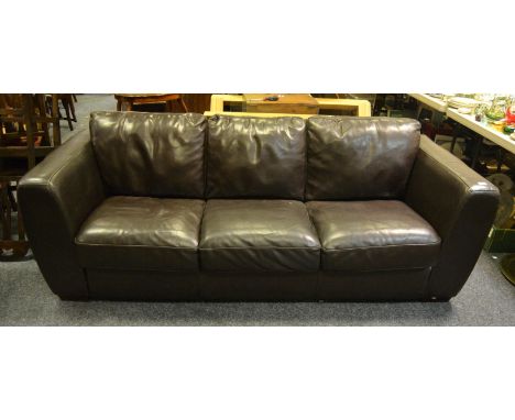 A contemporary three seater dark brown leather sofa