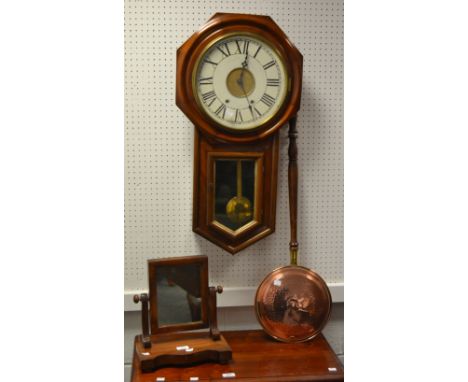 A mid-20th century wall-hanging clock, the painted dial with Roman numerals; a mahogany dressing glass; a copper warming pan 