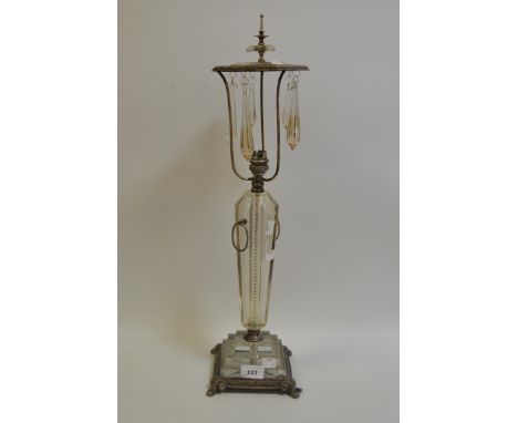 An Art Deco cut glass and silver plated table lamp faceted column on a stepped square base glass droplets c.1920