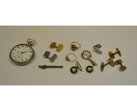 A 9ct gold ring, clear amethyst; a gold coloured metal ring stamped '18c'; a pair of engine turned silver cufflinks; a silver