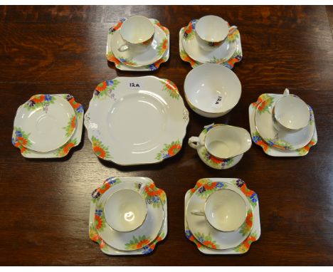 A Grafton china, part tea service, painted with orange and blue Daisy