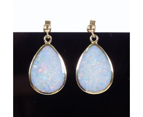 A pair of 9ct gold cabochon opal double-sided drop earrings, stud fittings, maker's marks MD, height excluding fitting 21.7mm