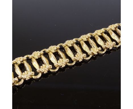 A Vintage heavy 9ct gold grapevine textured panel bracelet, maker's marks S and S, hallmarks London 1975, bracelet length 19.