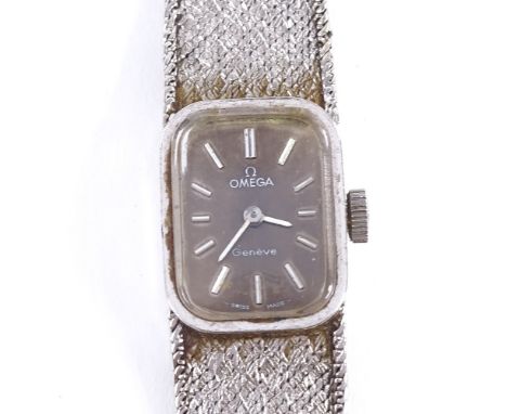 OMEGA - a lady's Vintage 9ct white gold Geneve mechanical wristwatch, ref. 1061, black dial with baton hour markers and 9ct t