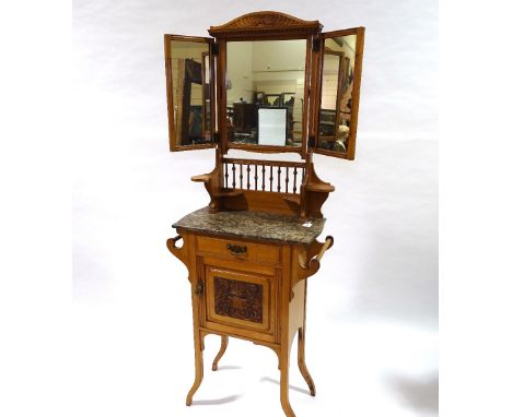 An Arts and Crafts light oak marble-topped wash stand, with mirror inset upper part 