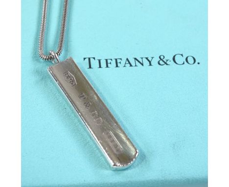 TIFFANY & CO - a sterling silver ingot pendant necklace, on original snake link sterling chain, dated 2001, pendant height 40