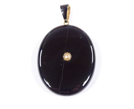 A Victorian unmarked gold black enamel split-pearl and onyx locket memorial pendant, with vacant hair panel, locket height ex