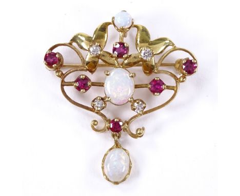 An Art Nouveau style 18ct gold opal, ruby and diamond pendant / brooch, pierced scrollwork settings, maker's marks PSR, hallm