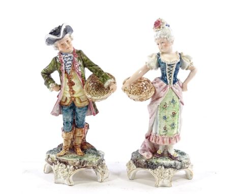 A pair of French ceramic figures, height 21cm 