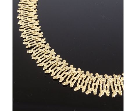 A Vintage 9ct gold abstract collar necklace, textured openwork settings, maker's marks JAM, hallmarks Birmingham 1976, neckla