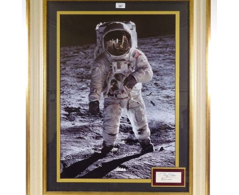 A large format photographic portrait of Buzz Aldrin on the moon, with inset original signature card, modern painted and gilde