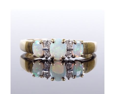 A 9ct gold 7-stone cabochon opal and diamond dress ring, setting height 5.1mm, size O, 2.7gVery good original condition, all 